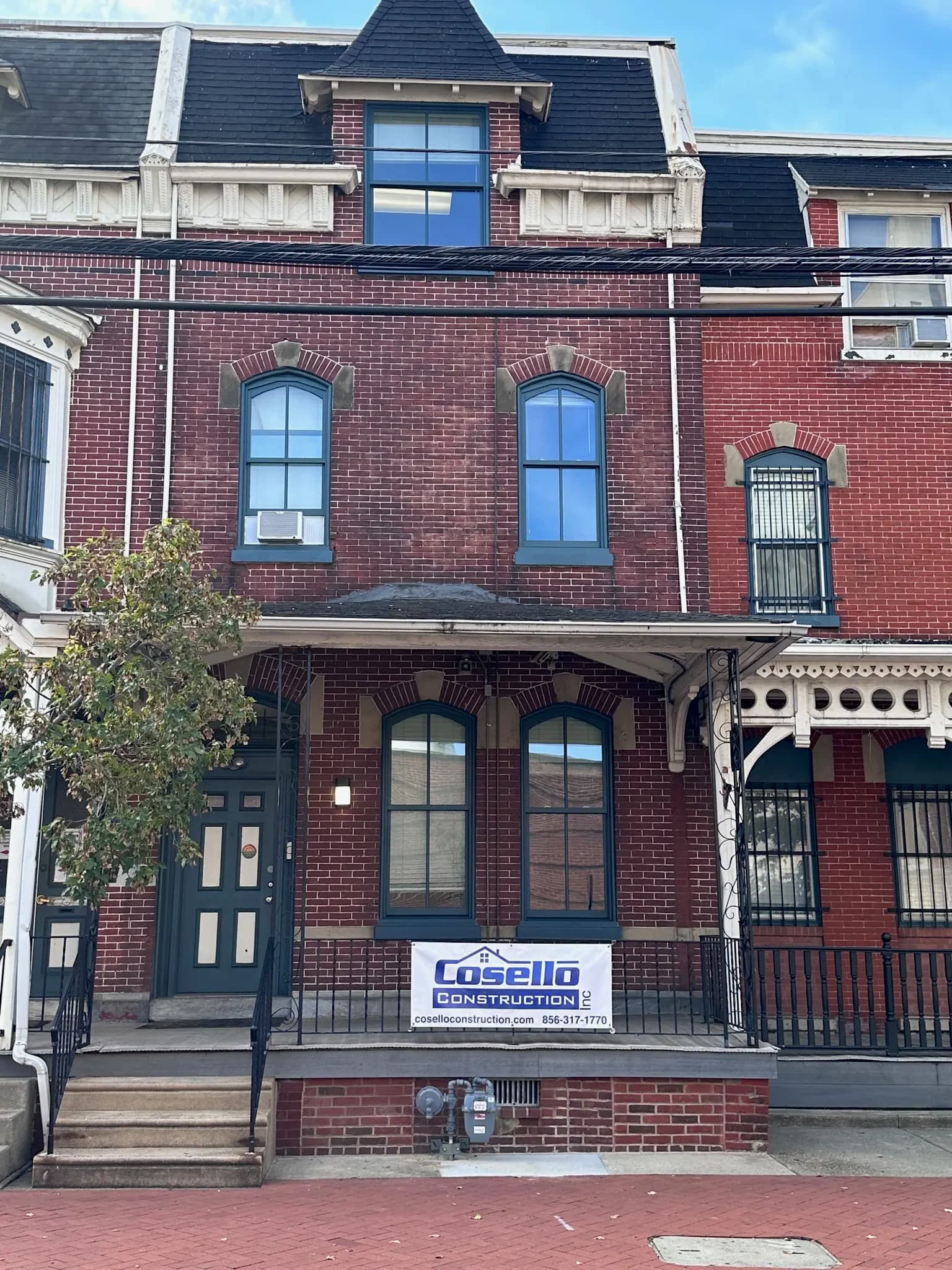 Bay window installation on brick home